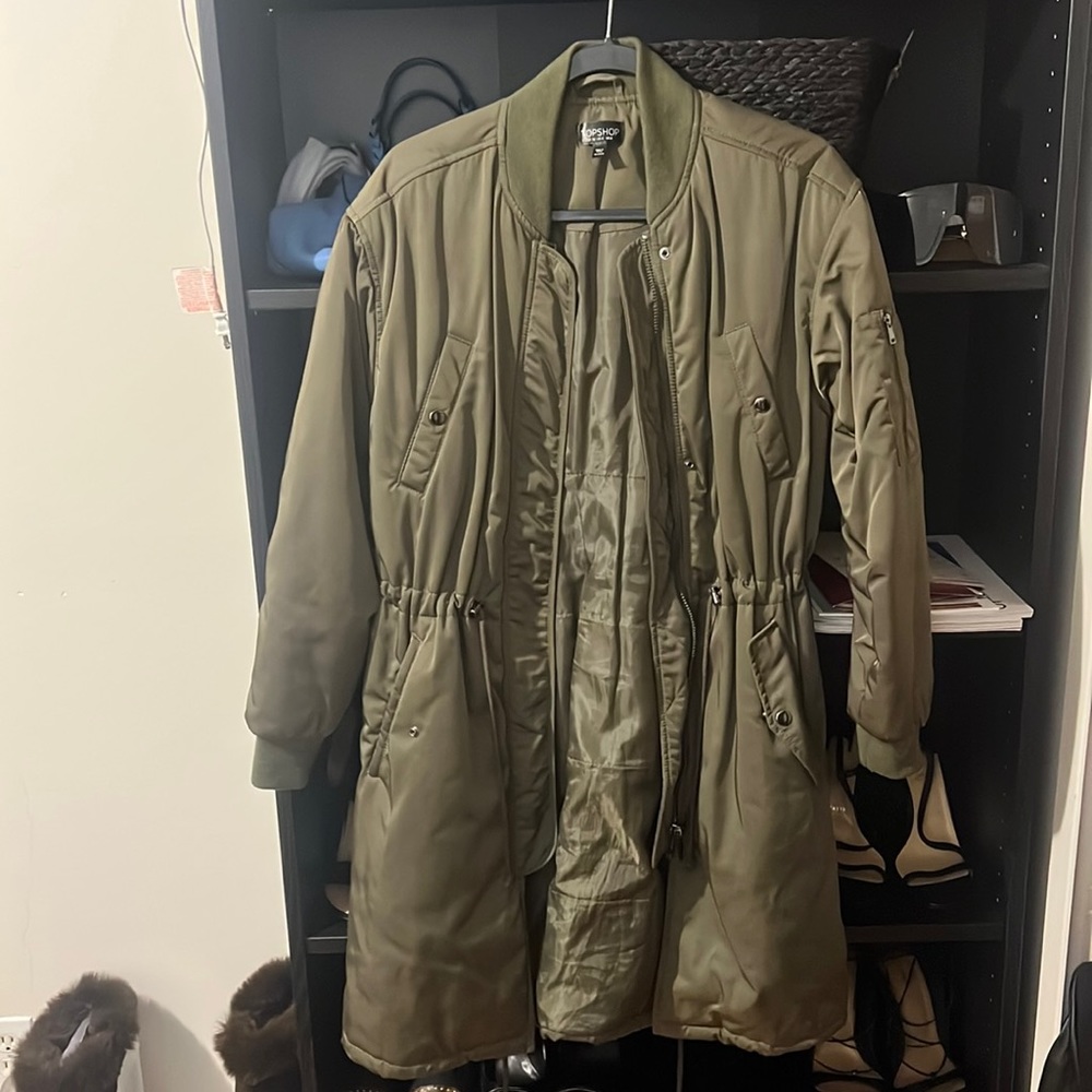Long green Topshop bomber with long zipper,4 pockets, zipper pocket on shoulder